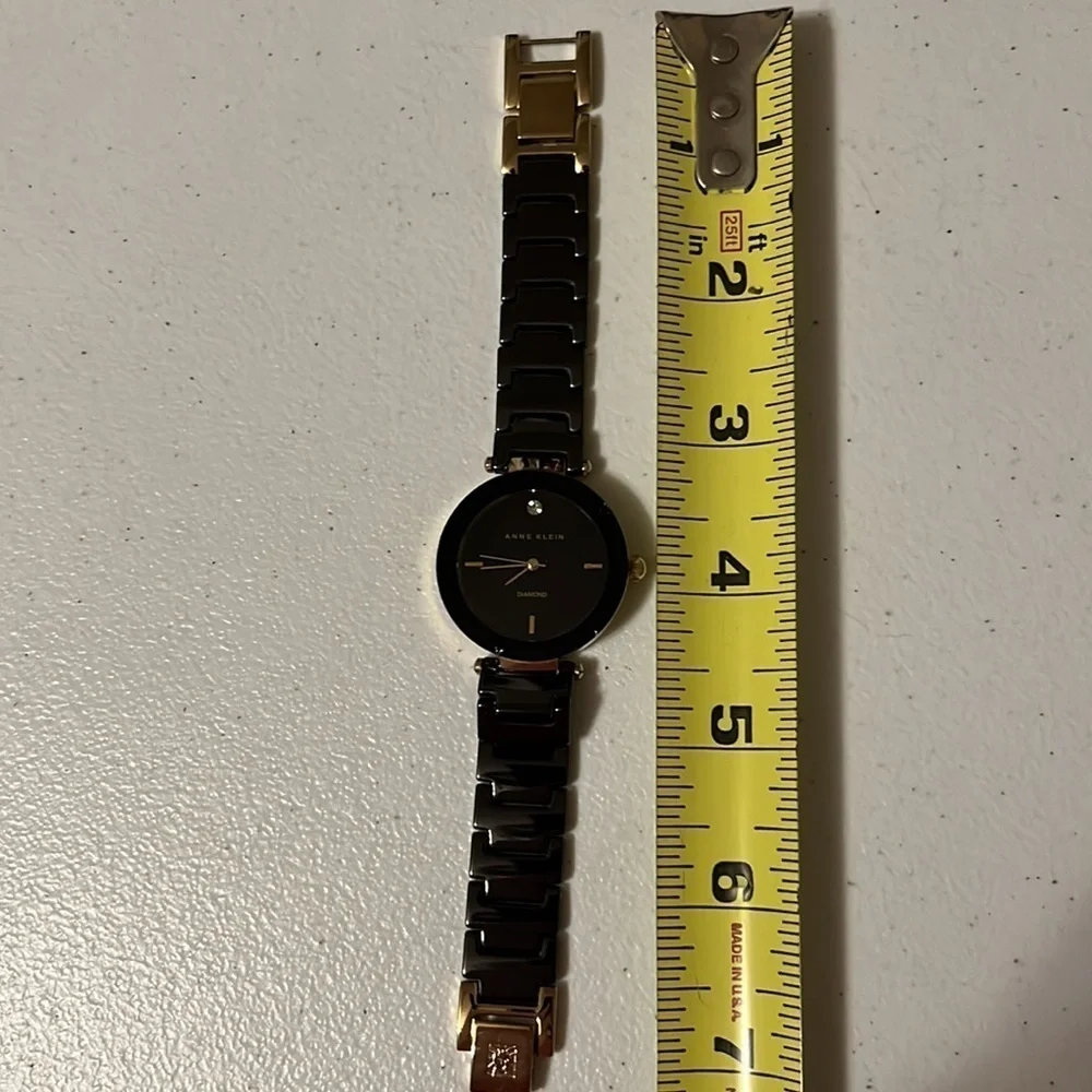 Anne Klein black and gold watch